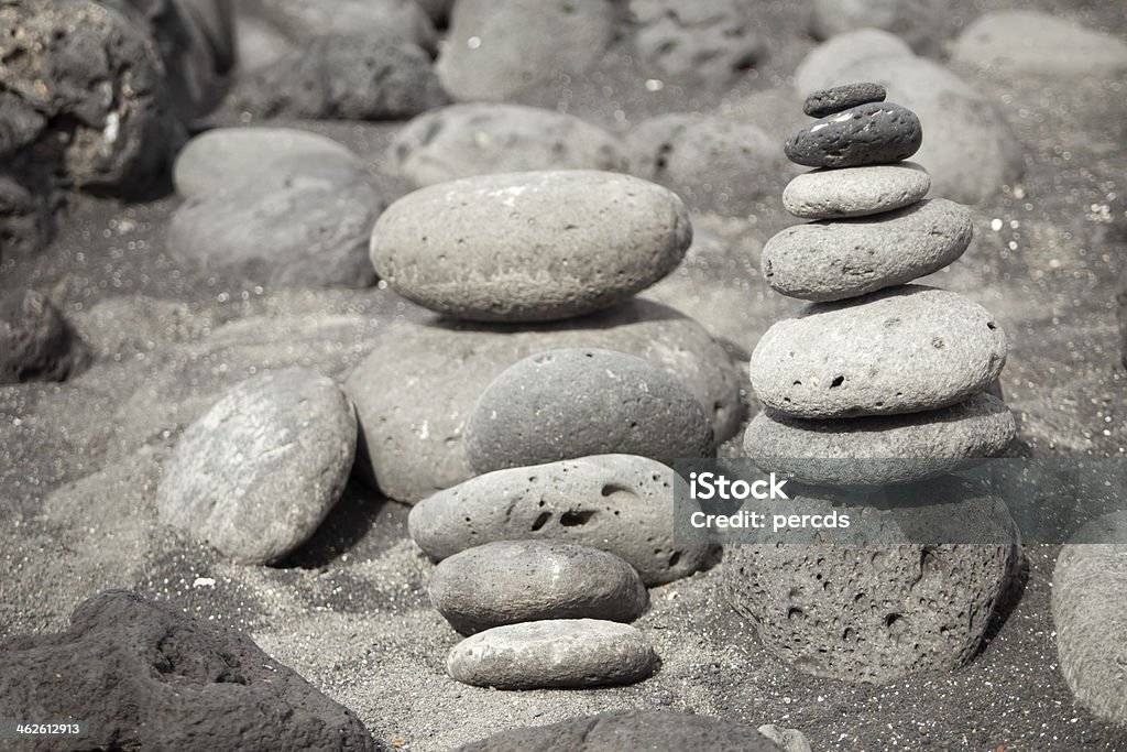 Stacks of pebbles Stacks of volcanic pebbles in Lanzarote, Canary islands, Spain. Atlantic Islands Stock Photo