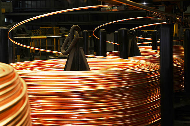 Large reels of thick copper wire Copper pipes factory copper cable stock pictures, royalty-free photos & images