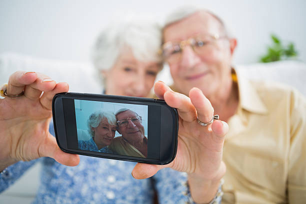 istock Aged couple taking pictures 462618283
