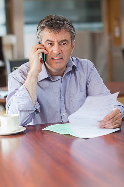 istock Man doing business in a coffee shop 462623605