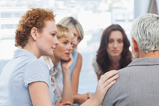 istock Businesswomen supporting their co worker telling story 462637447