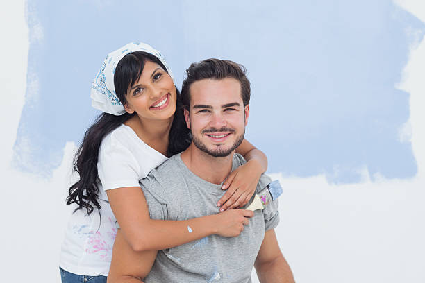 istock Cute couple in front of a wall 462637637