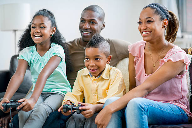 istock black family playing video games 462640669