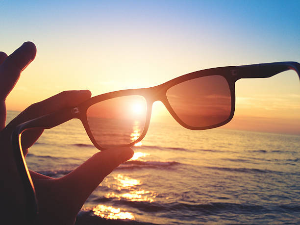 istock sunglasses against sunlight on summer 462642975