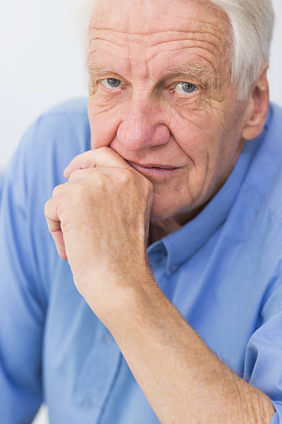 istock Unsmiling mature man thinking in his kitchen 462648979