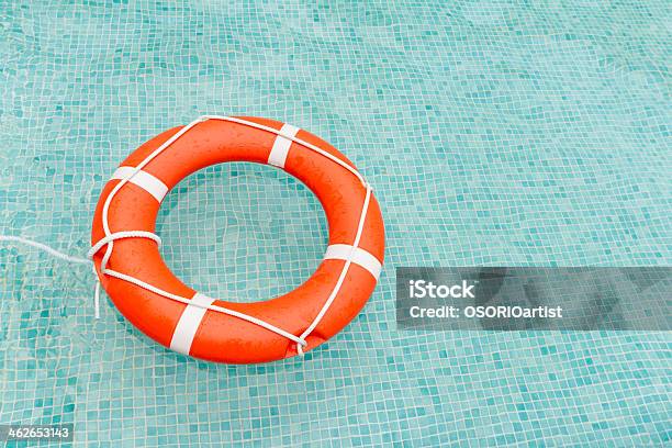 Lifeguard Floating In Swimming Pool Stock Photo - Download Image Now - Buoy, Circle, Equipment