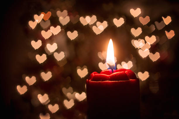 istock Candle and Heart Shaped Bokeh 462660403