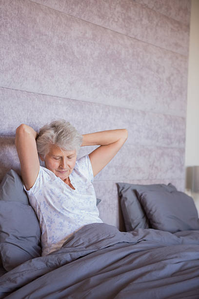 istock Mature woman getting up 462674803