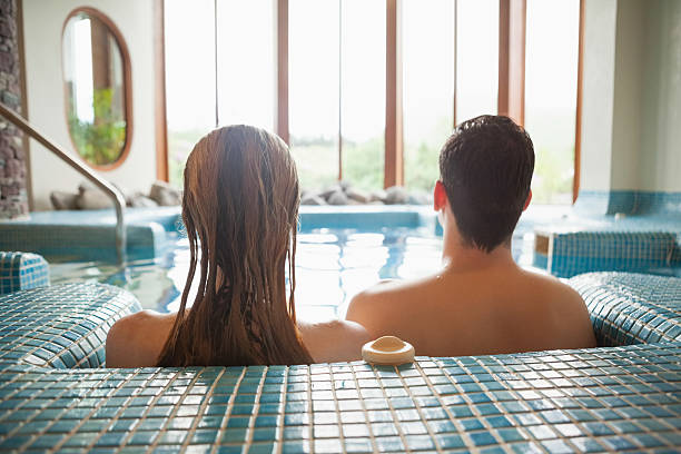 istock Calm couple relaxing in swimming pool 462674817