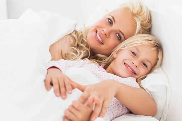 istock Mother and daughter hugging 462675025