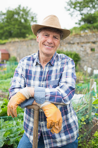 istock Smiling mature gardener posing looking at camera 462676423