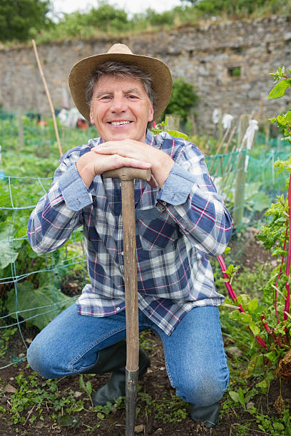 istock Joyful mature gardener posing looking at camera 462676437