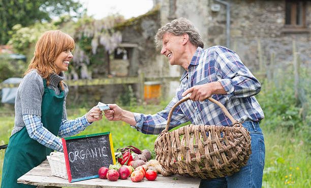 istock Laughing mature man buying vegetables 462681117