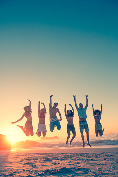 istock Happy friends jumping in row 462681523