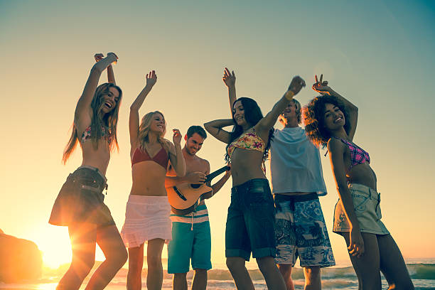 istock Group of friends having fun on the beach 462681561