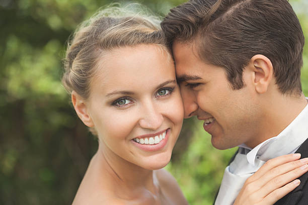 istock Happy young newlyweds posing embracing 462682483