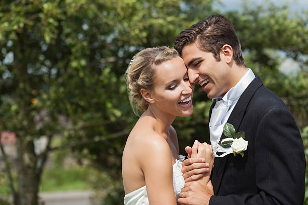 istock Joyful young newlyweds posing laughing together 462682497