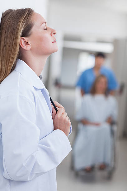 istock Disappointed doctor against a wall in hospital 462710659