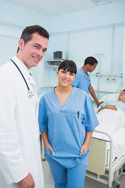 istock Nurse and doctor smiling 462712113