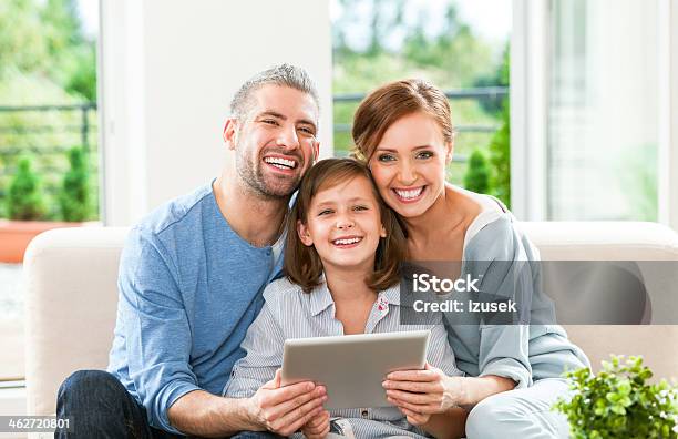 Happy Family With Digital Tablet Stock Photo - Download Image Now - 10-11 Years, 30-34 Years, 30-39 Years