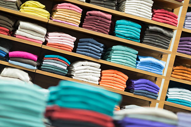 istock Jumpers cardigans and sweatshirts stacked on shelves 462721025