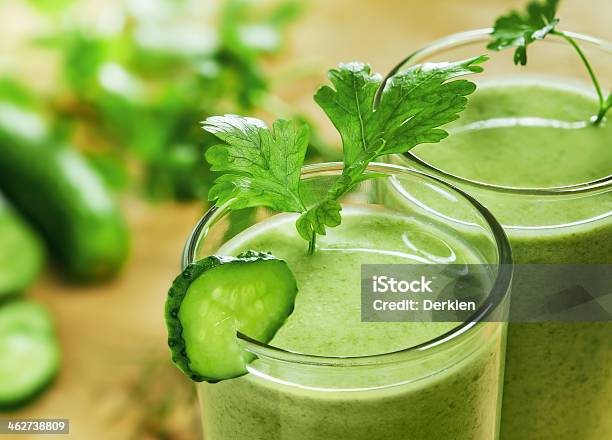 Two Green Smoothies In A Glass Stock Photo - Download Image Now - Antioxidant, Basil, Blended Drink