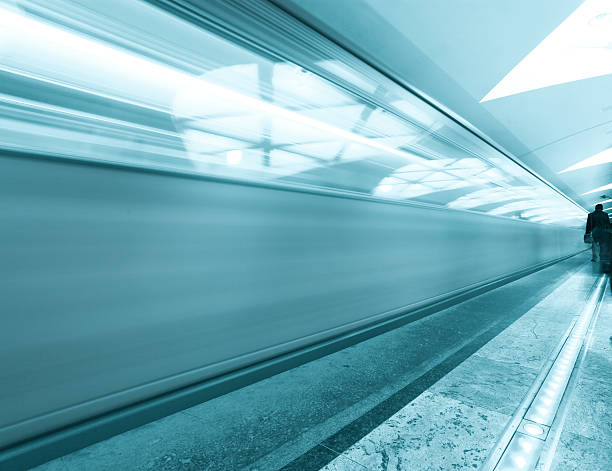 istock modern illuminated metro station with train motion 462756375