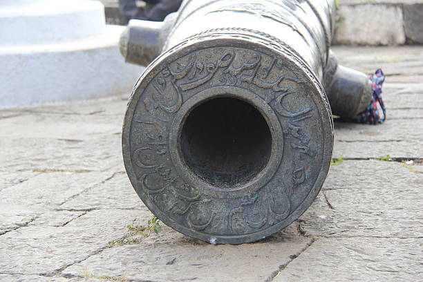 A moghul era cannon with parsian script atop the bastion in Paranda Fort in Osmanabad, India