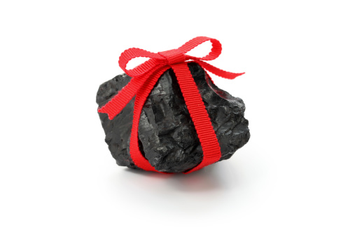 coal lump with red ribbon, christmas present for bad boys and bad girls