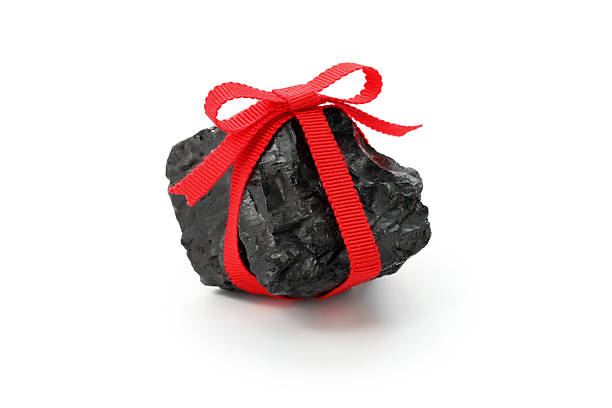 coal with red ribbon stock photo
