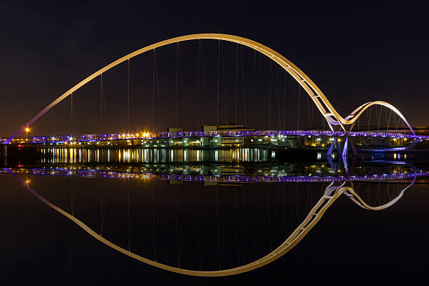Infinity Bridge Infinity Bridge in Stockton-on-Tees across the River at Night teesside northeast england stock pictures, royalty-free photos & images