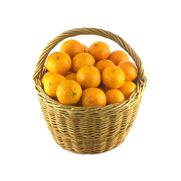 istock Tangerines in brown wicker basket isolated 462764059