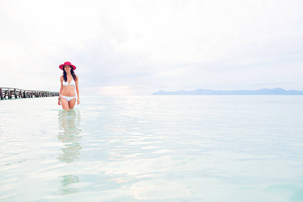 istock young woman by the sea 462769209