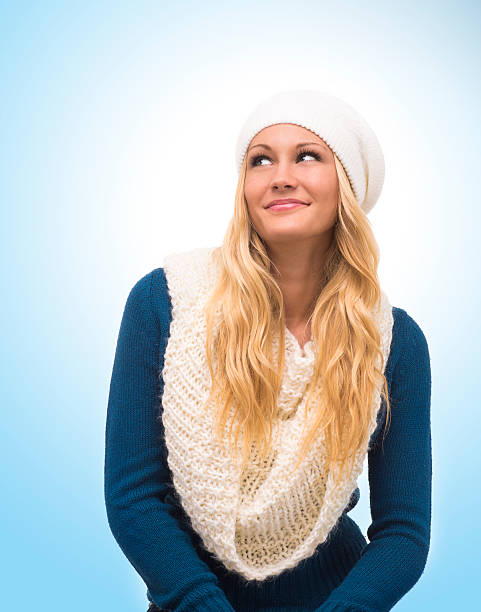 istock Pretty girl in winter clothes thinking 462769753