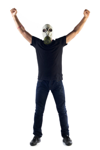 An activist man in gas mask