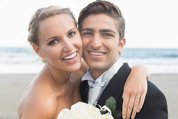 istock Content lovely young newlyweds posing looking at camera 462772327
