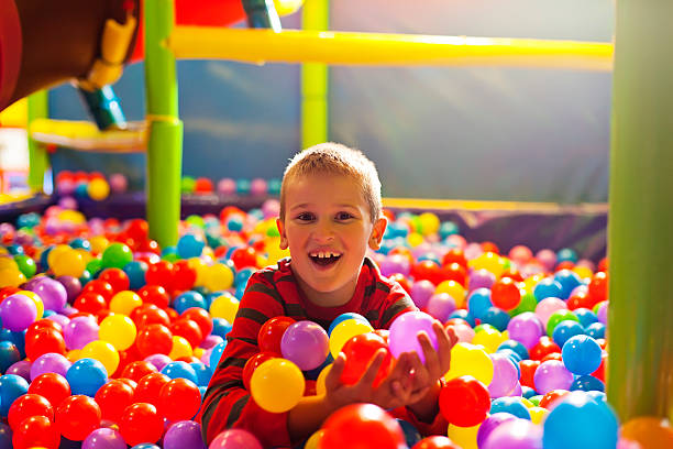 istock Little boy in the ball pool 462772855