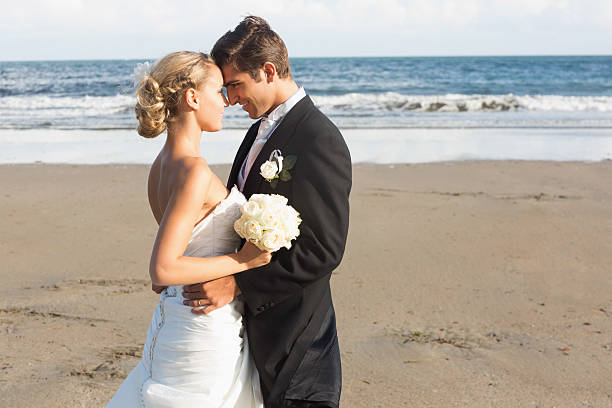 istock Pleased lovely young newlyweds posing looking each other 462776125