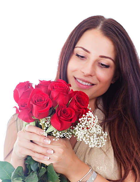 istock Woman with a bouquet of red roses 462777041