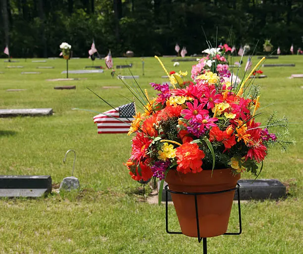 Photo of flower bouquet at grave site