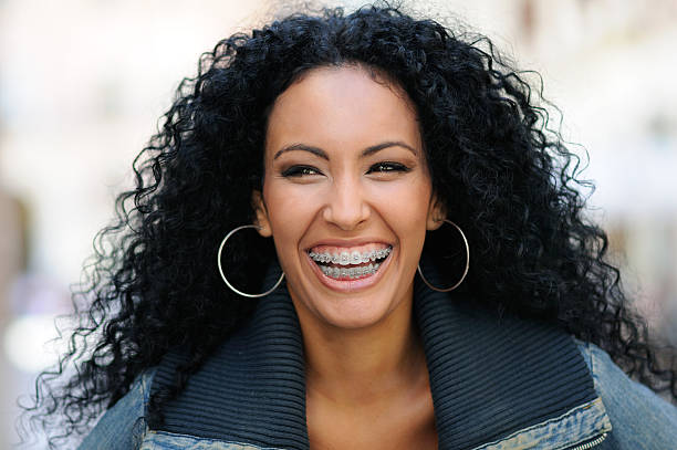 istock Happy black girl with braces 462790867