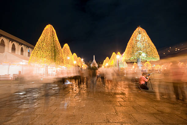 istock people walking in Grand Palace at night 462791307