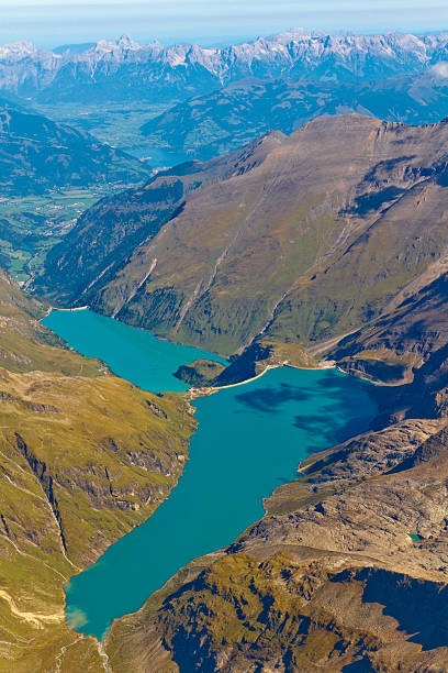 istock Kaprun reservoir lake aerial view, Austria 462796045