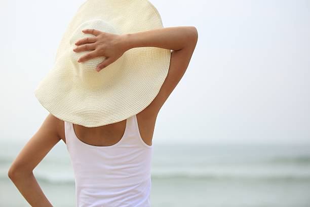 istock vacation woman stand at beach 462796215