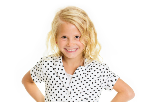 A fun portrait of a cute sassy little girl. Isolated on a white background