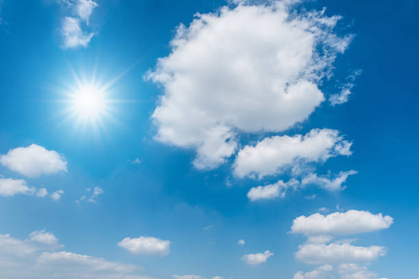istock beautiful blue sky with clouds and the sun 462797781