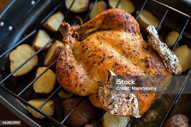 Oven Roasted Chicken With Potatoes Stock Photo - Download Image Now - Baked, Baking Sheet, Brown