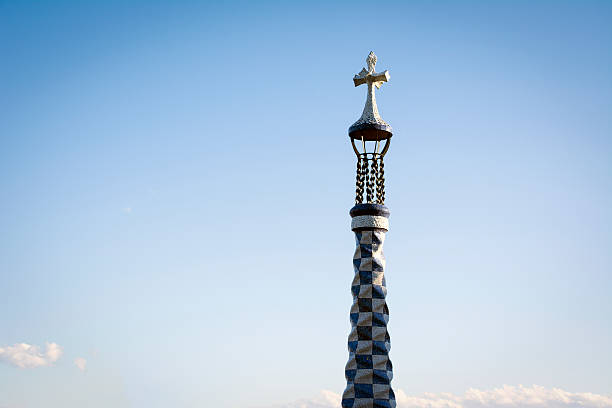 istock Church spire by Gaudi in Parc Guell Barcelona 462804107