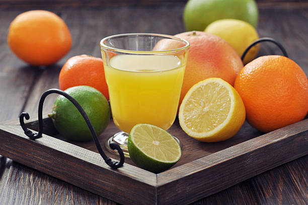 istock Citrus juice and fruits 462837167