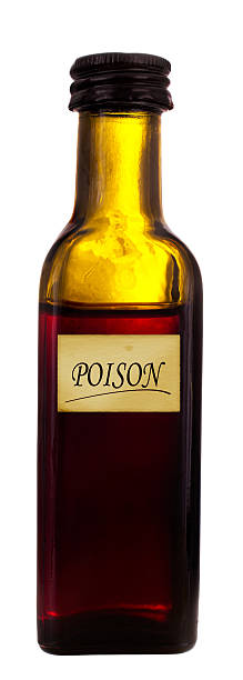 istock Old medicine bottle with poison label, isolated over white 462837389